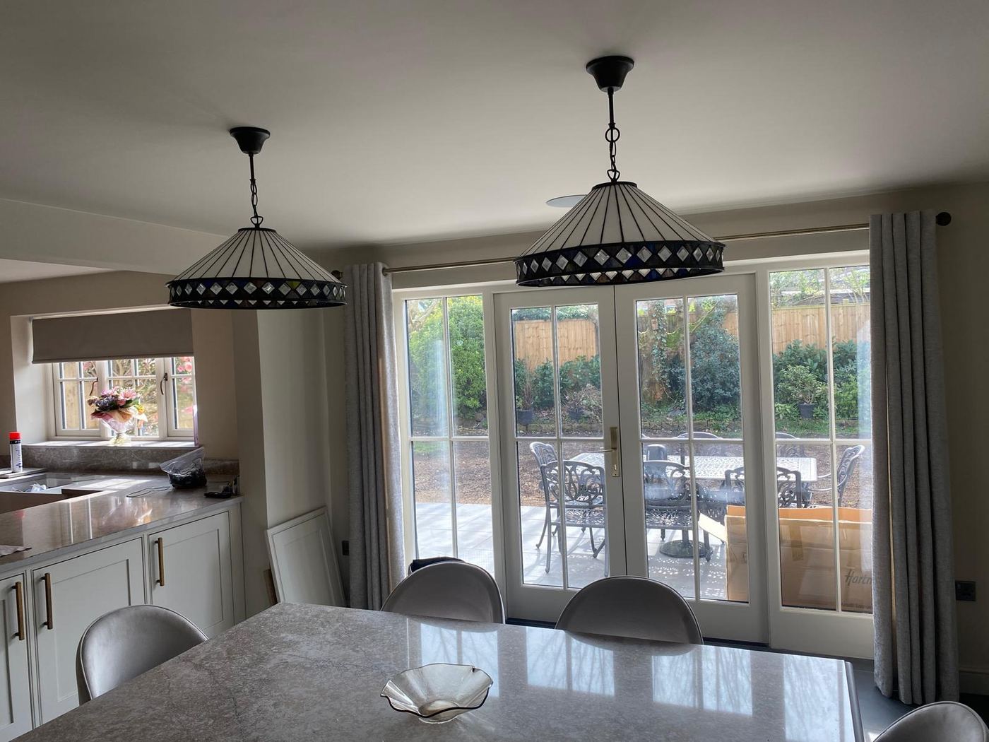 Pendant lights over a dining table
